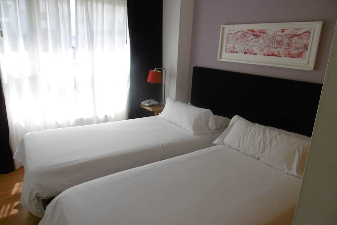 Schlafzimmer von Appartement 106 Hotel Cilene del Faro Suites & Spa