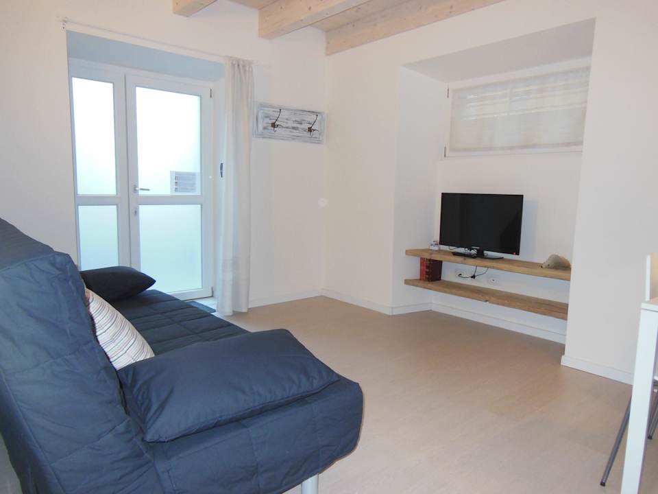 The living room...so cute! San Martino Bike & Climb Apartment