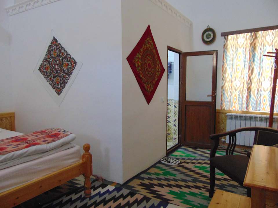 Zimmer Madrasah Polvon-Qori Boutique