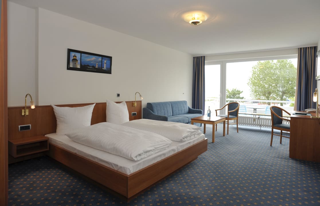 Das "Strandzimmer" mit Blick auf den Hafen (1. OG) Acqua Strande Yachthotel
