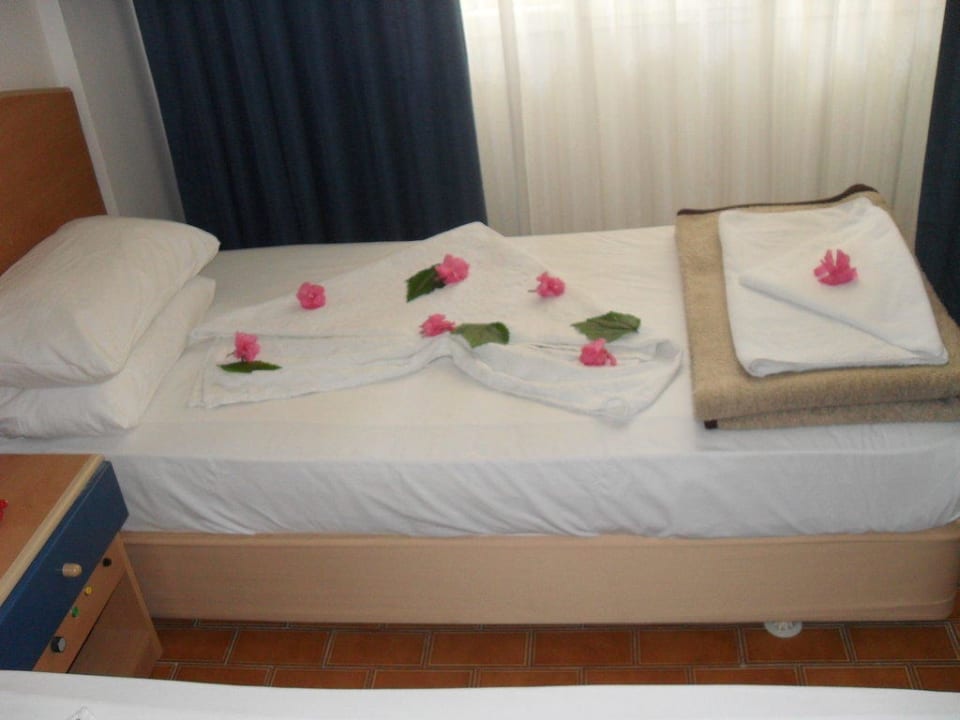 Dekoriertes Bett Club Sidelya Hotel