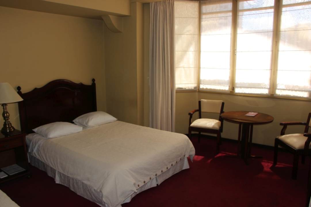 Zimmer El Rey Palace Apart Hotel