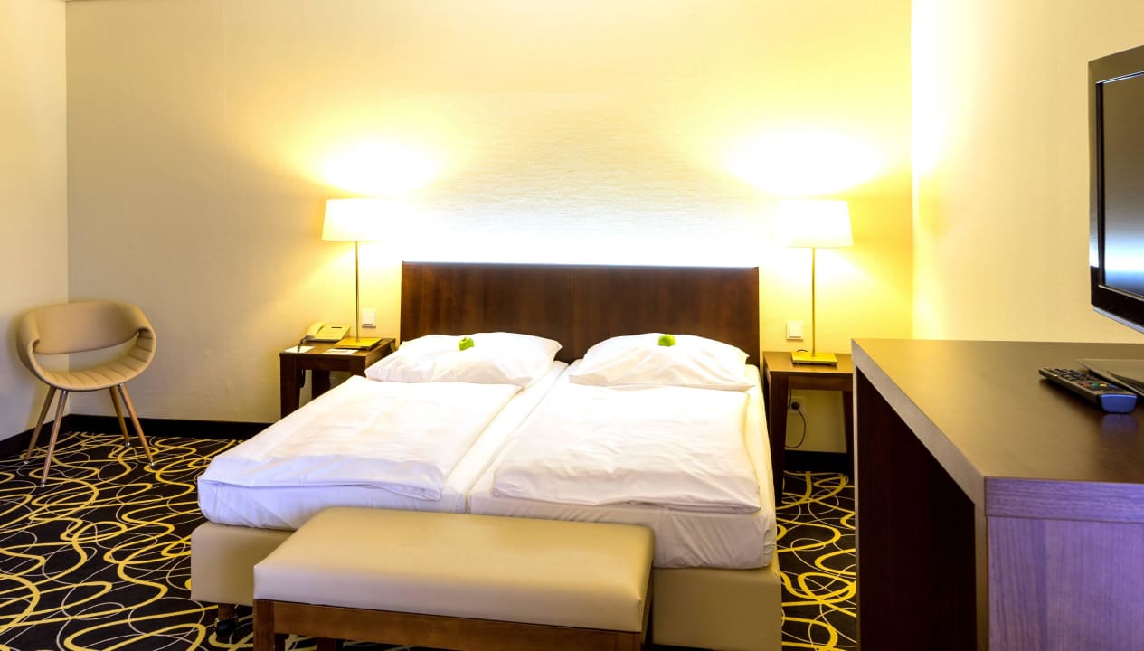 Schlafbereich in der Juniorsuite relexa hotel Berlin