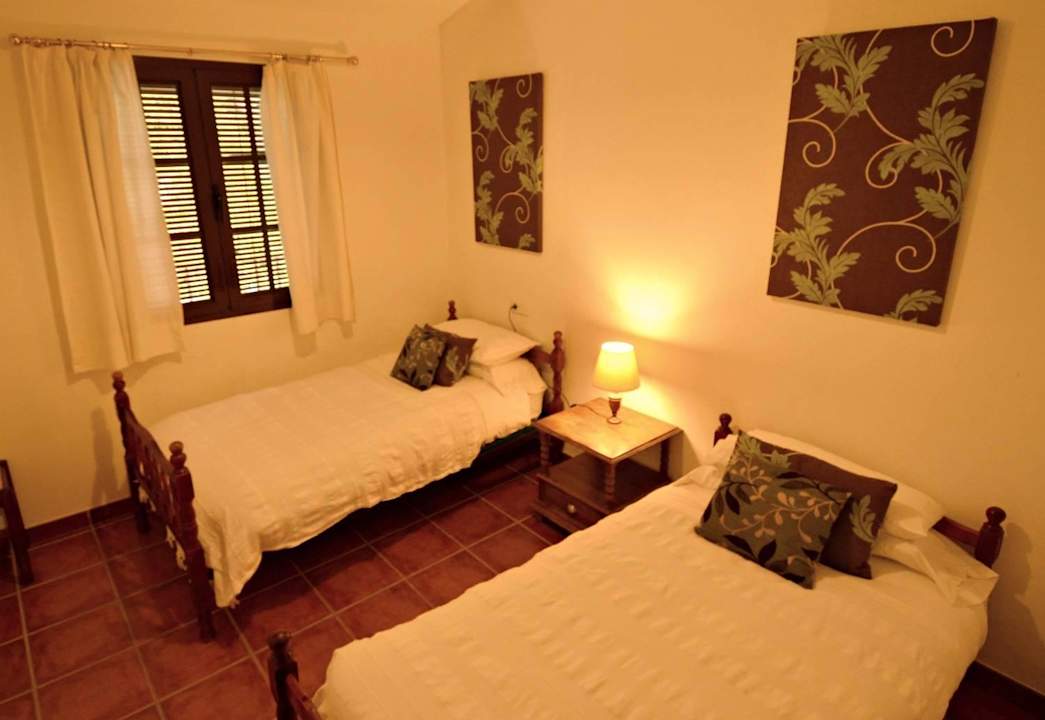 Single bedroom with two beds Casitas de la Sierra