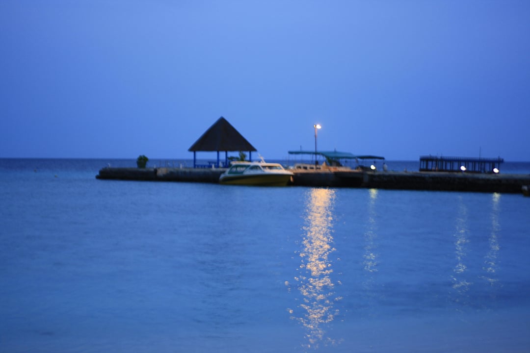 Der Steg am Abend Summer Island Maldives
