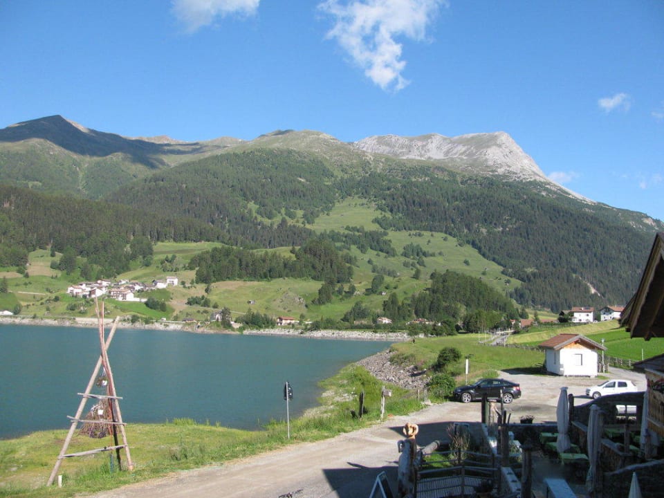 Blick von der Terrasse des Chalets auf den See Mein Dörfl Alpenchalets