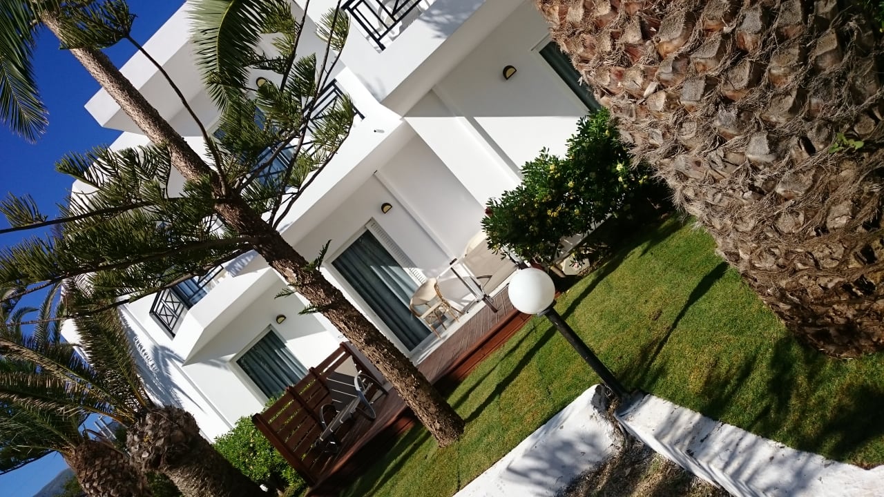 Gartenanlage HARPIN Happy Days Beach Hotel