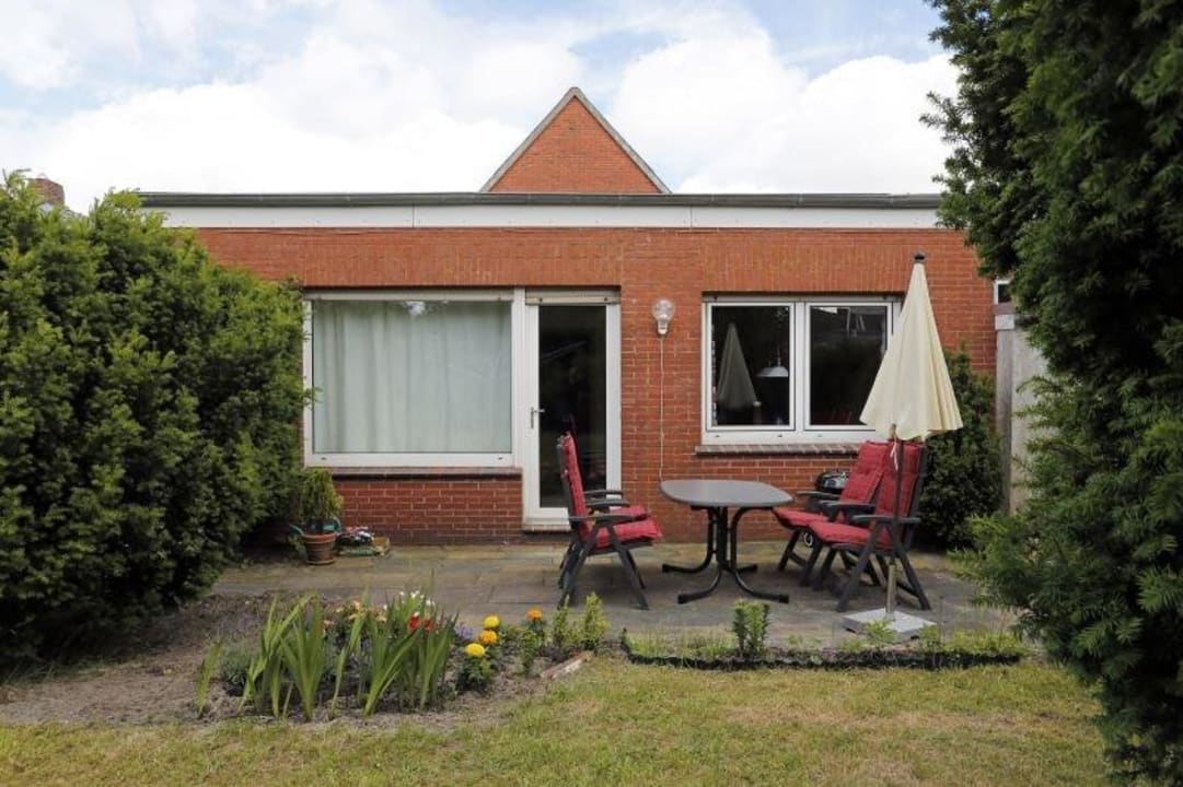 Außenansicht Haus Achterlangs Upstalsboom Ferienwohnung im Haus Achterlangs
