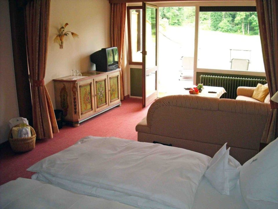 Jenner-Zimmer Wohnbereich Alm- & Wellnesshotel Alpenhof