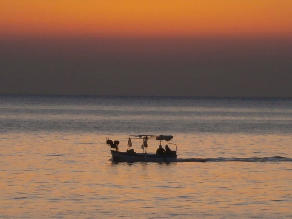 Fischerboot beim Sonnenaufgang Lydia Maris Resort & Spa