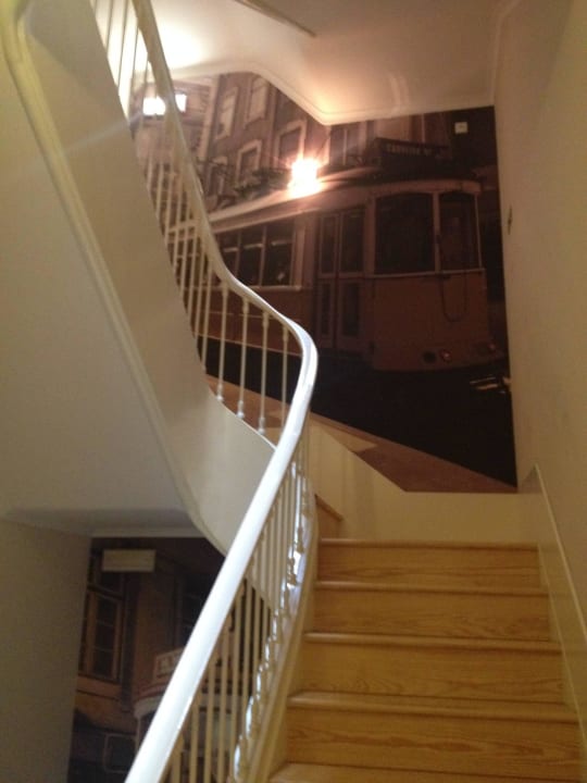 Treppe mit schönen Fotos My Story Hotel Ouro
