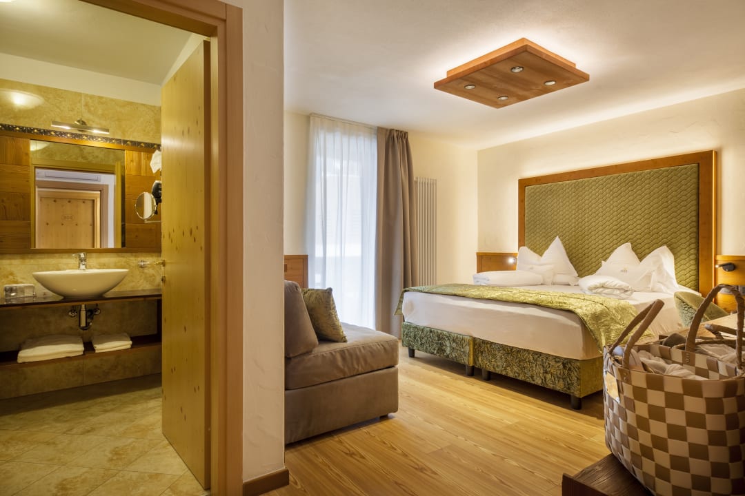 Zimmer ADLER MERYEM Wellnesshotel – Andalo