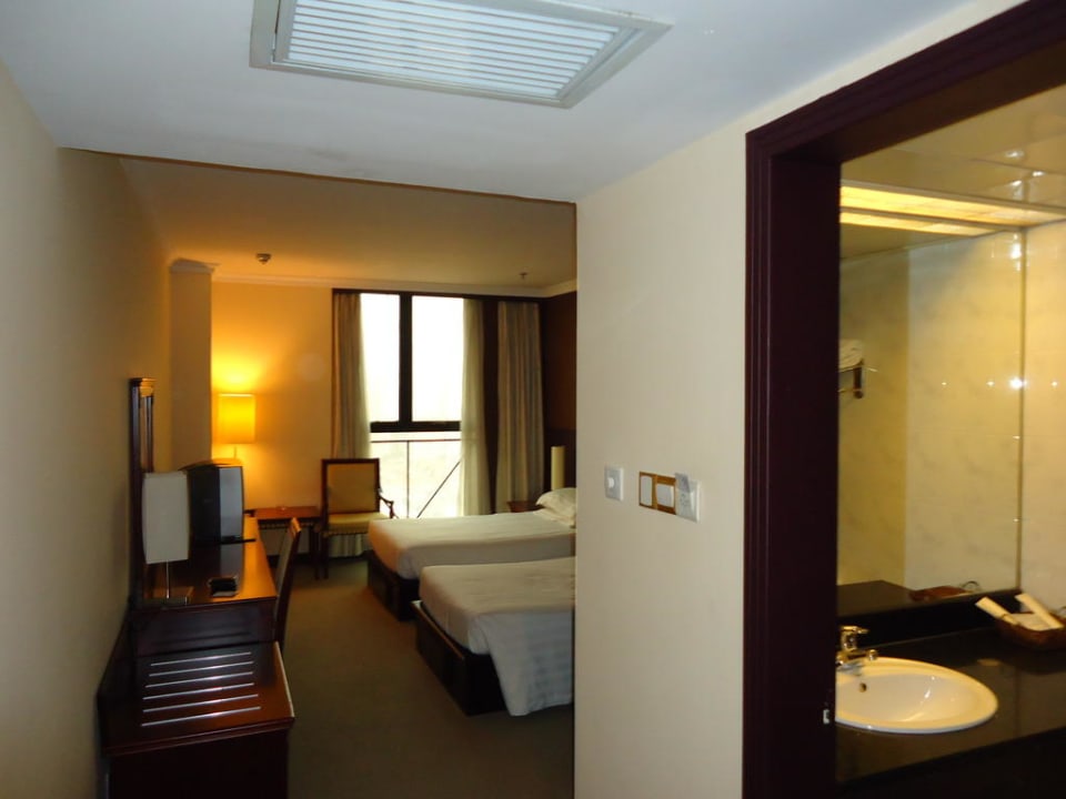 Zimmer  Magnificent International Hotel