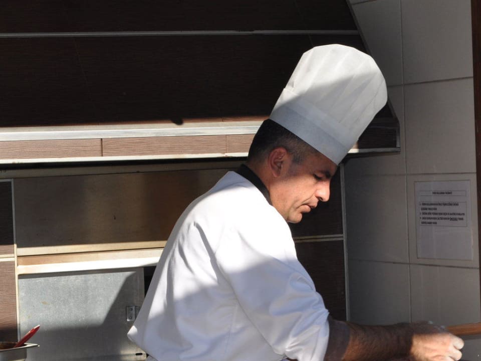Der humorvolle Pizzabäcker  Port Side Resort Hotel