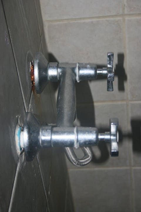 Armatur in der Dusche Hotel Coral Island Resort