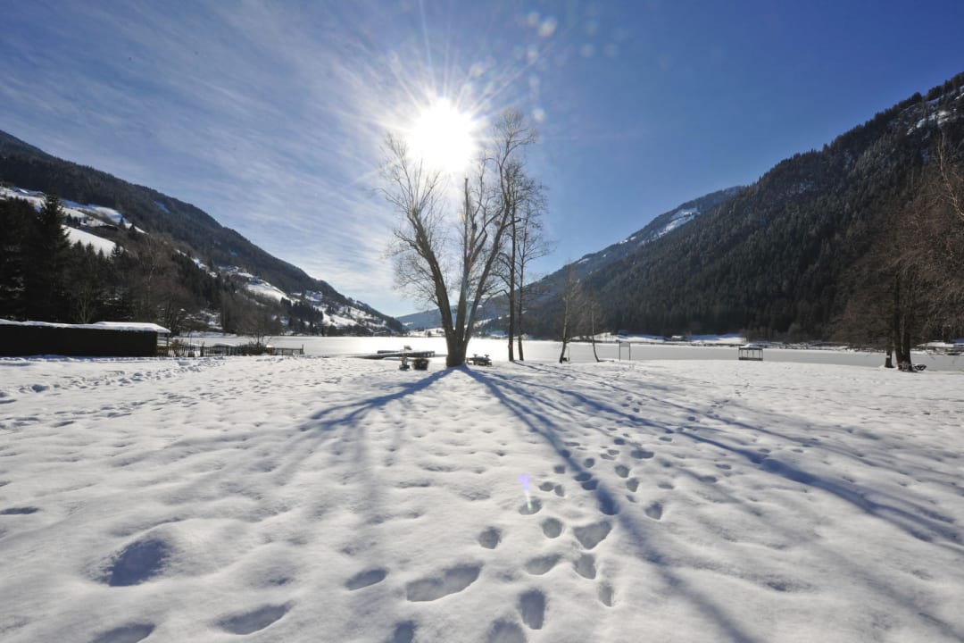 Schneebedeckte Nockberge Familien -Sportresort Brennseehof