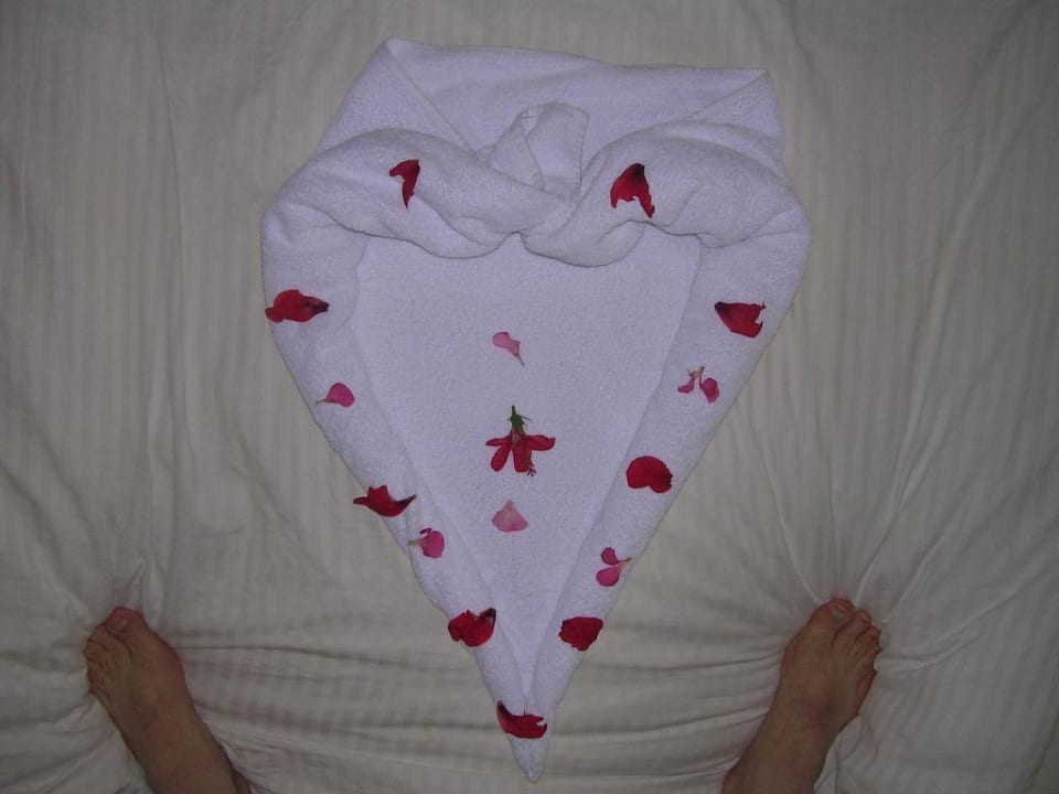 Geschmückte gemachte Betten Parrotel Aqua Park Resort