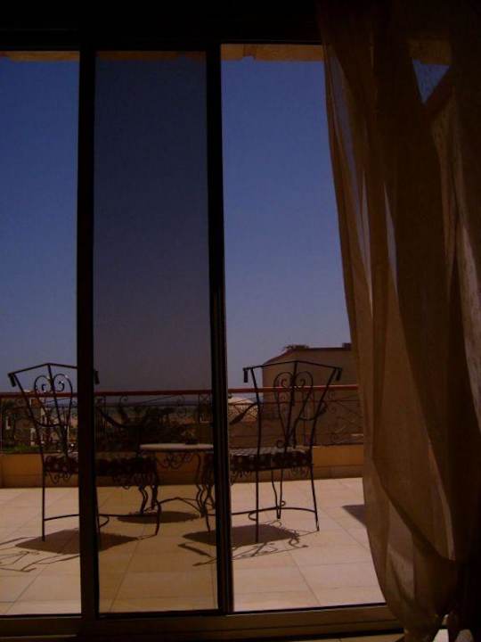 Widok z pokoju na taras Regency Plaza Aqua Park & Spa