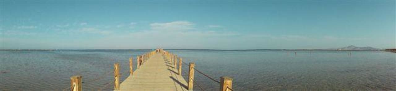 Panoramaaufnahme vom Strand  Hotel Tropicana Azure Club