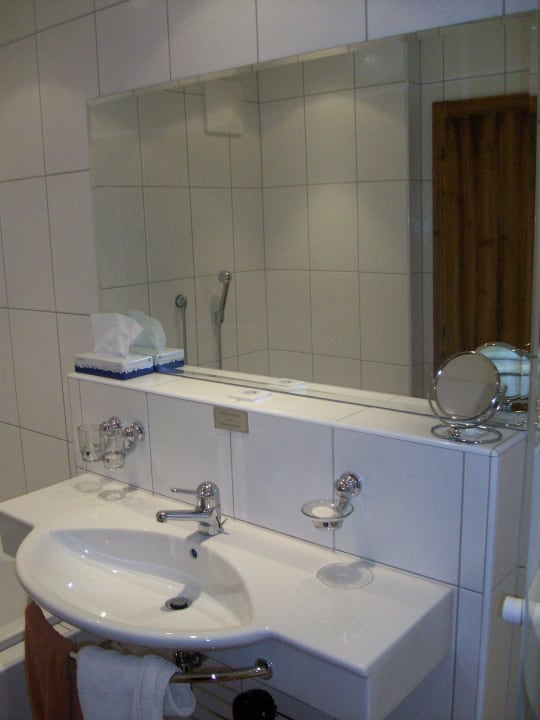 Bad in der Suite Hubertus Hotel & Apartments