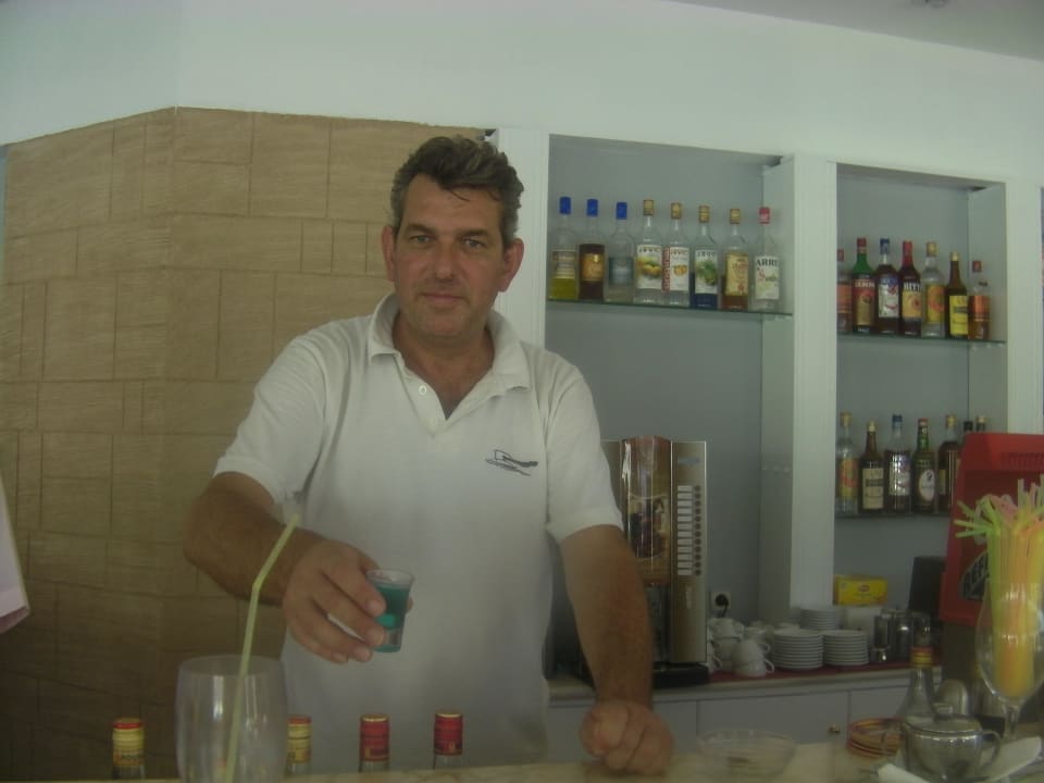 Karlos - the best barkeeper ever! Lindos White Hotel & Suites