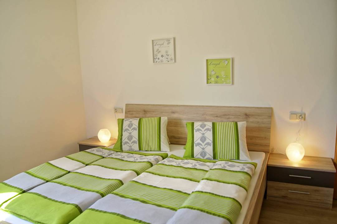Schlafzimmer Lilie Ferienhaus Mitterer