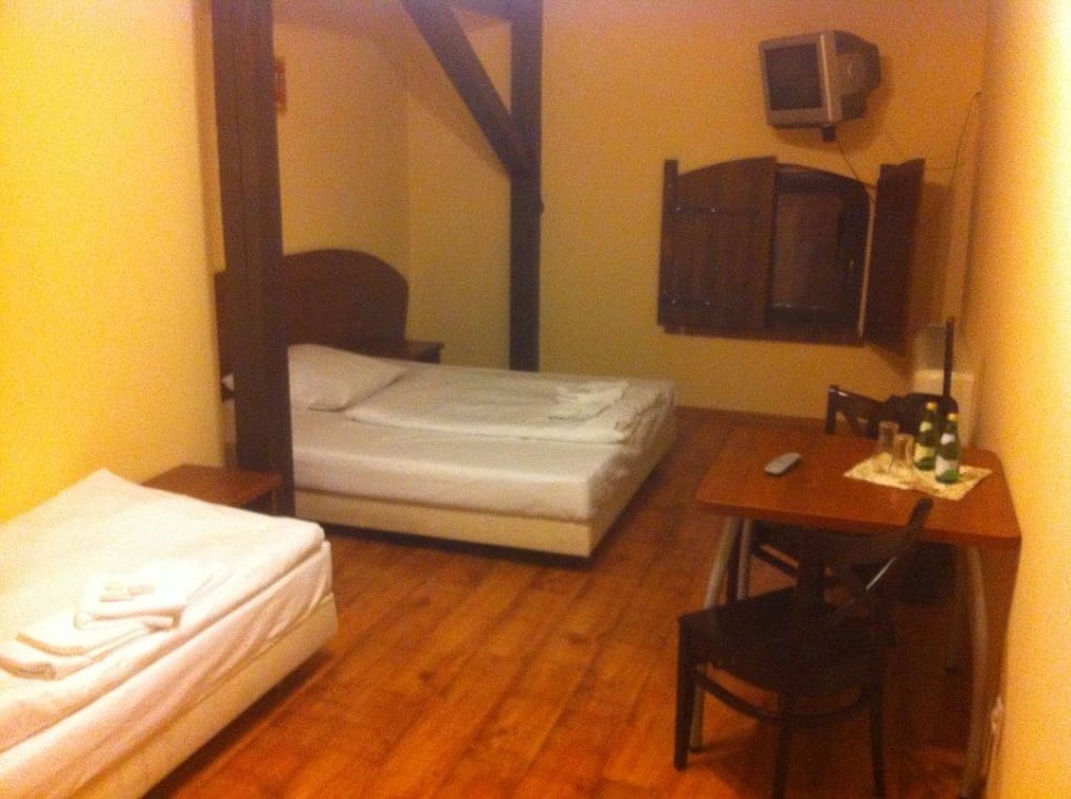 Schlafzimmer / Sicht auf das Bett Hotel Browar