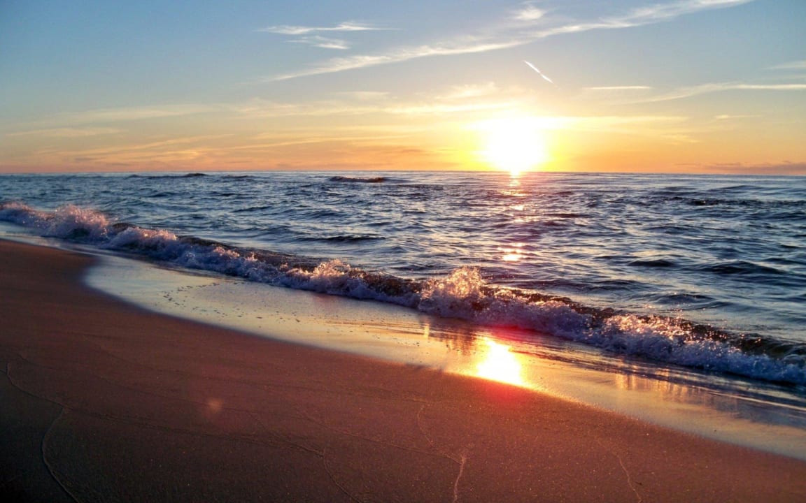 Sonnenuntergang am Senatorstrand Hotel Senator