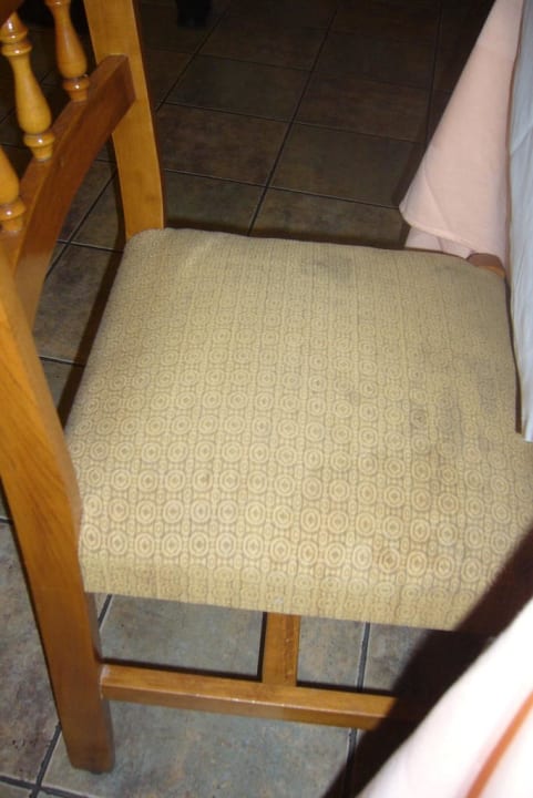 Fleckiger Stuhl Hotel Athos Palace