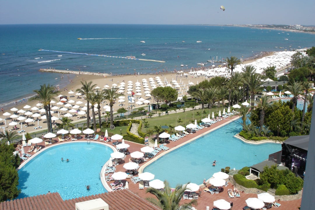 Strand und Pool aus dem 7. Stock gesehen PALOMA Perissia