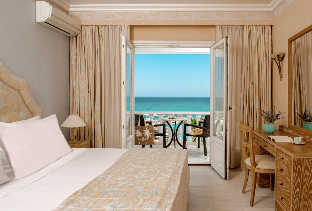 Zimmer Mitsis Rinela