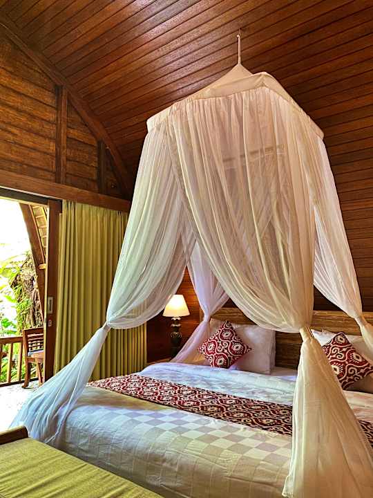 Zimmer Uma Linggah Resort by Puri Signatures