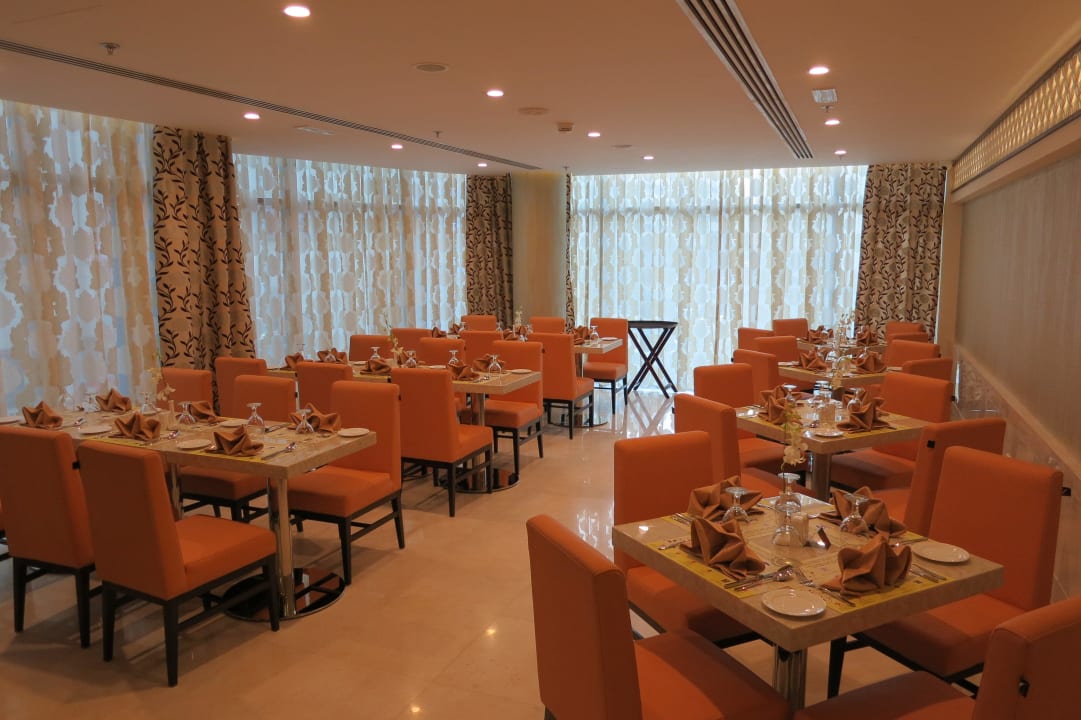 Frühstücksraum und Coffee Shop Landmark Premier Hotel