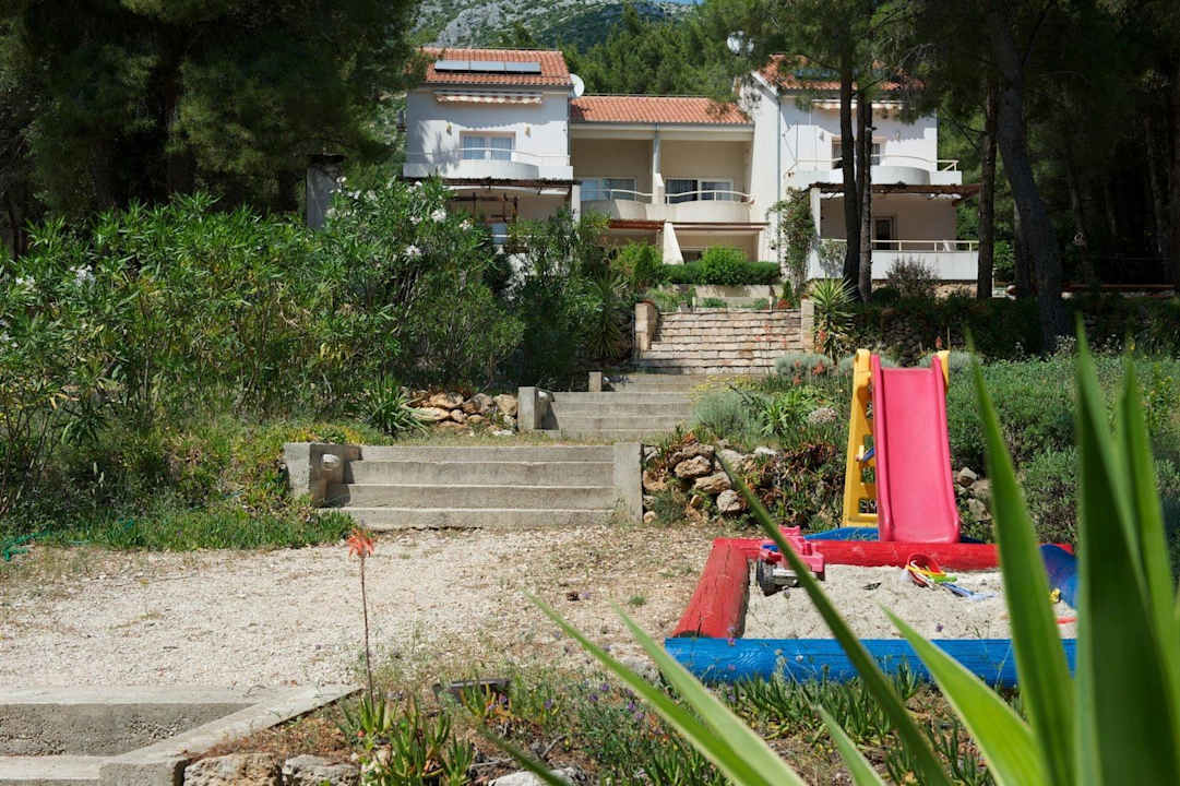 Toboggan for children in garden Apartments Deveron