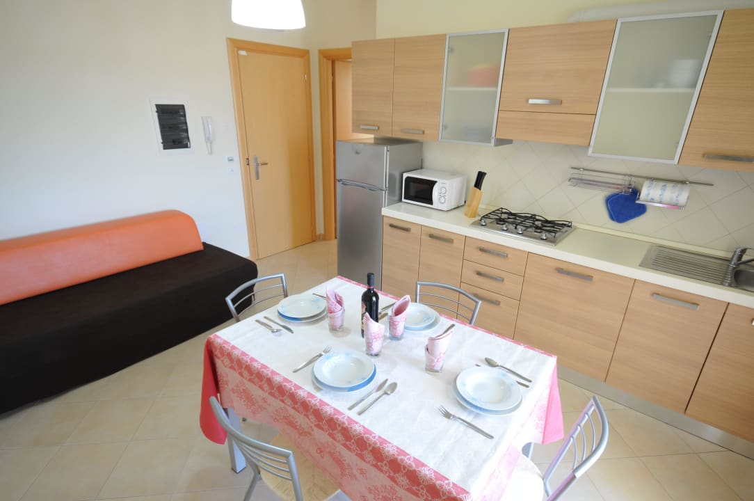 Soggiorno con cucina e divano letto Residence Cleo