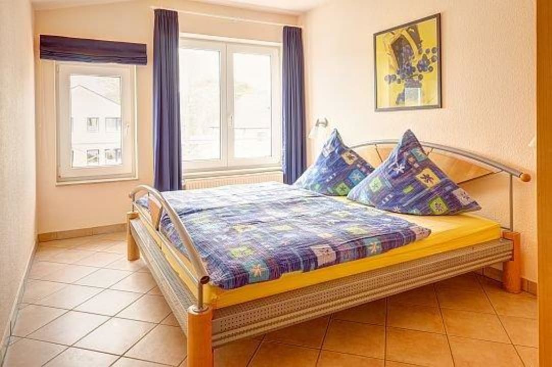 Wohnungsbeispiel Schlafzimmer Ferienwohnanlage Haus Strandburg