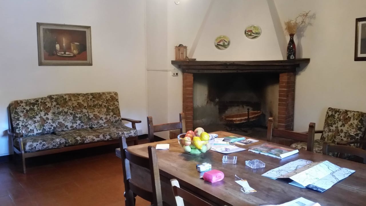 Wohnzimmer mit offenem Kamin Hotel Fattoria Castelvecchi