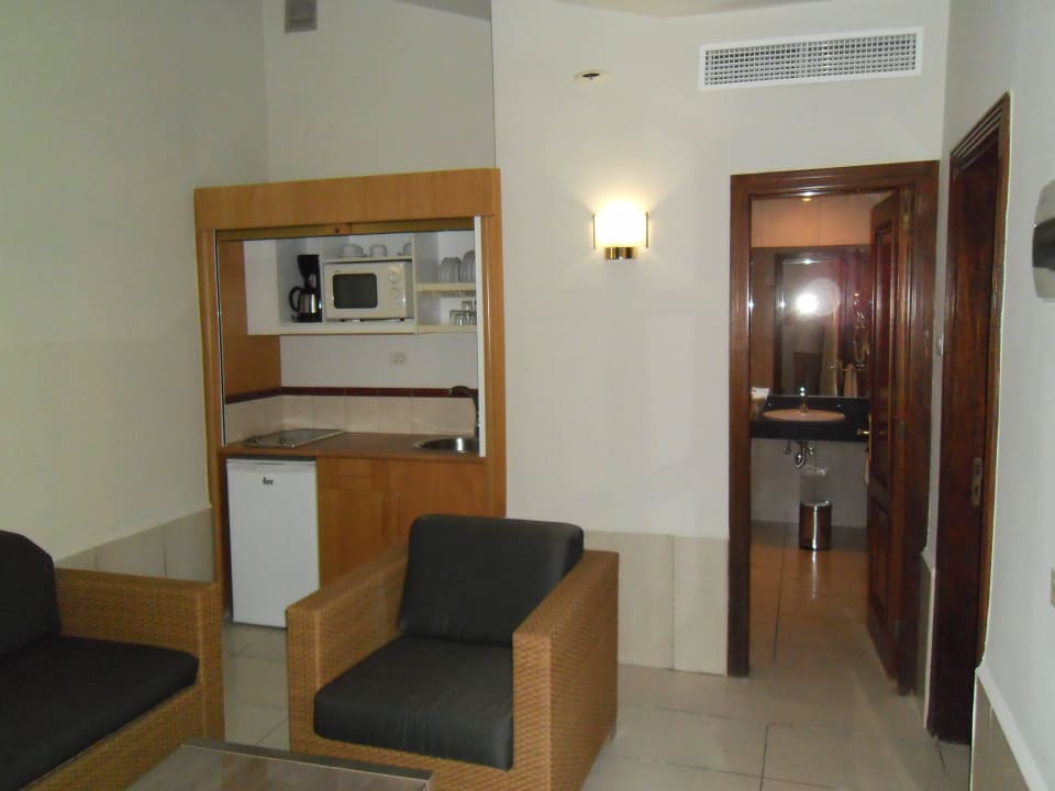 Wohnzimmer + Küchenzeile Suites & Villas by Dunas