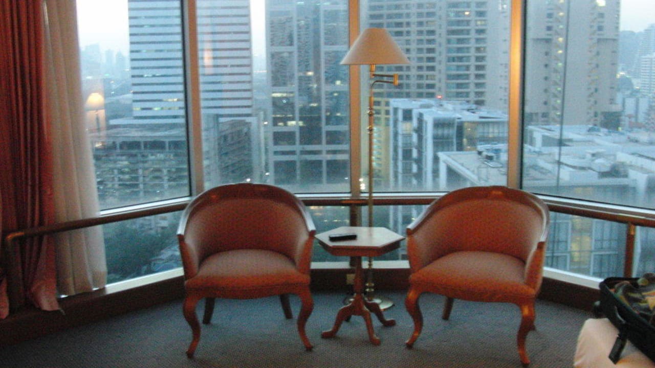 Sitzecke im Schlafzimmer Hotel Windsor Suites & Convention