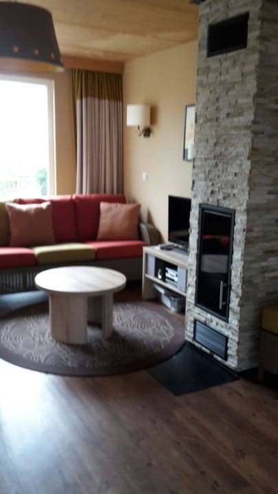 Wohnzimmer mit Kamin Center Parcs Park Bostalsee