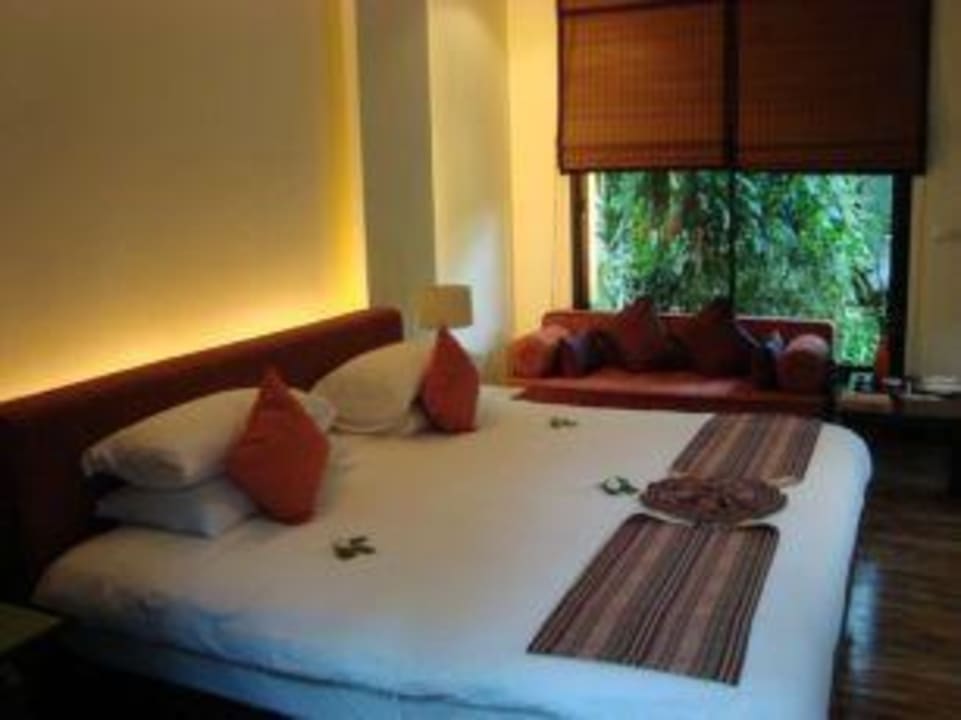 Bett und Sofa-Ecke Le Paradis Boutique Resort & Spa