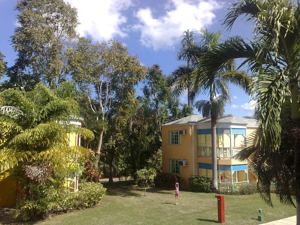 Cottages auf der Gartenseite Hotel Grand Pineapple Beach Negril