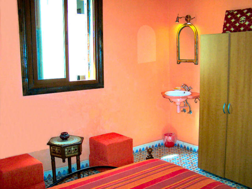 La chambre saumon Maison d'hôtes de la cité portugaise