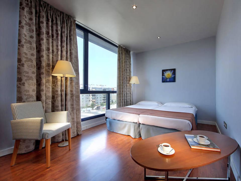 Habitación Hotel Exe Sevilla Palmera