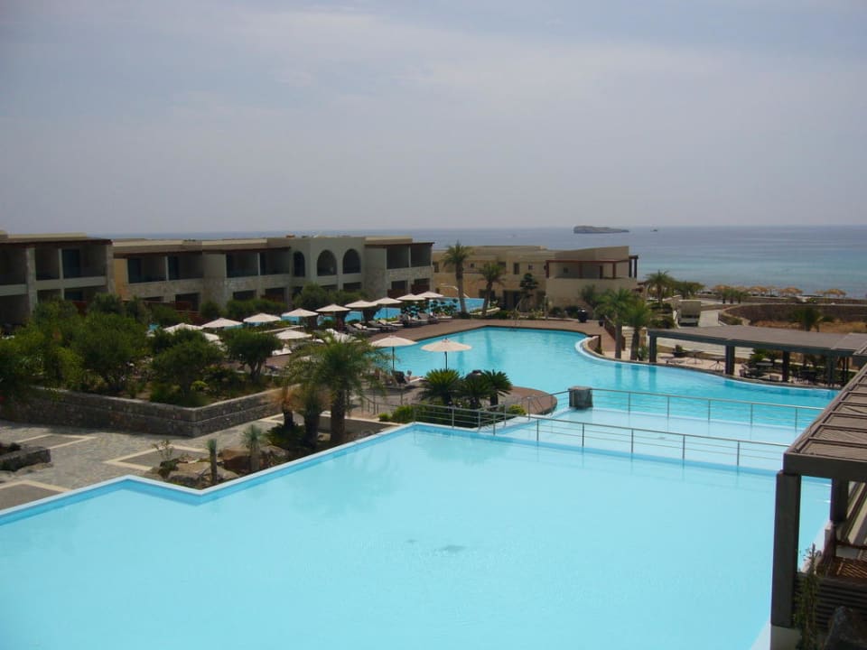 Obere Poolanlage von der Barterrasse fotografiert  Aquagrand Artistic Luxury Beach Resort - Adults only