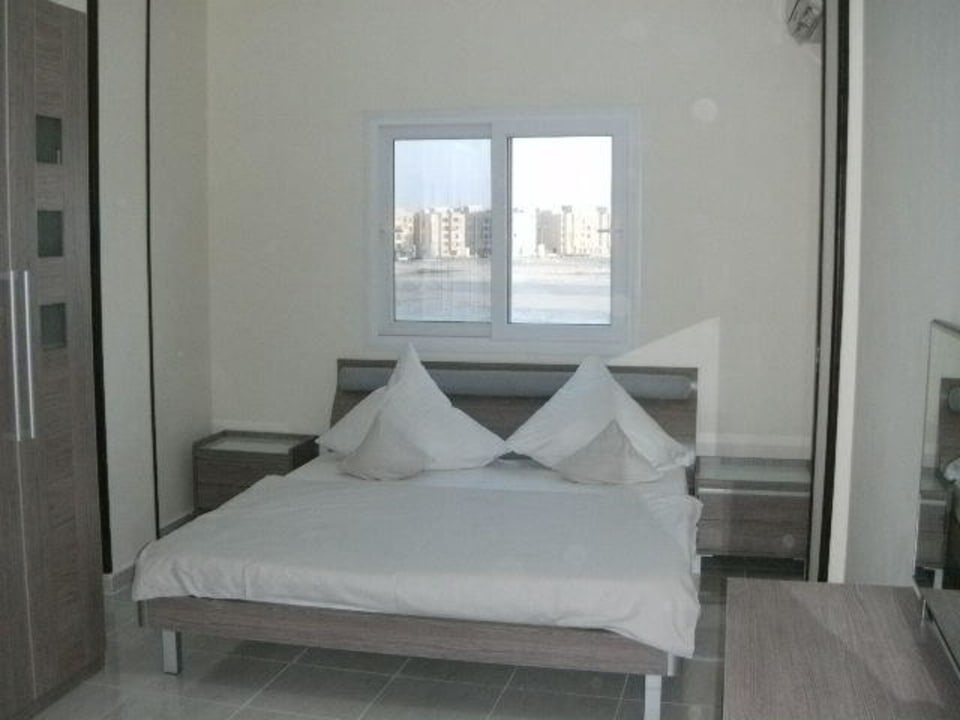 Schlafzimmer mit Doppelbett Fair Holiday Ferienwohnungen