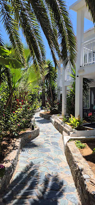 Gartenanlage HARPIN Happy Days Beach Hotel