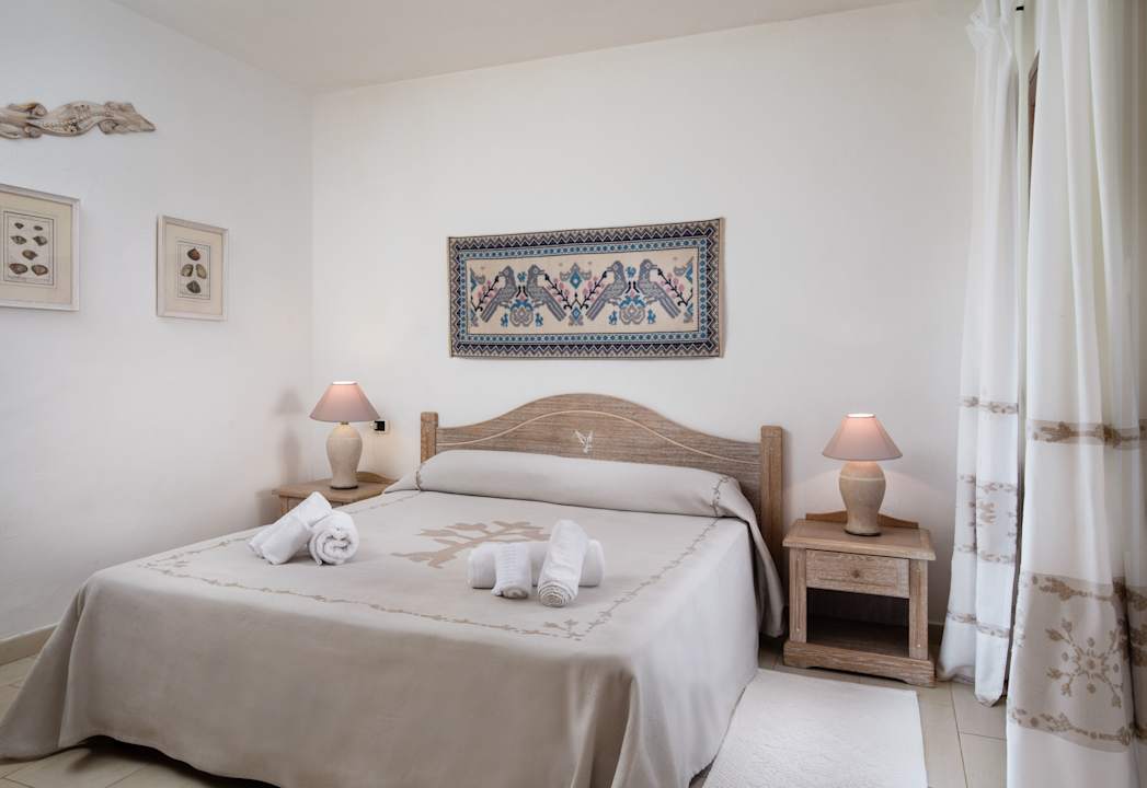 Zimmer Punta Falcone Resort