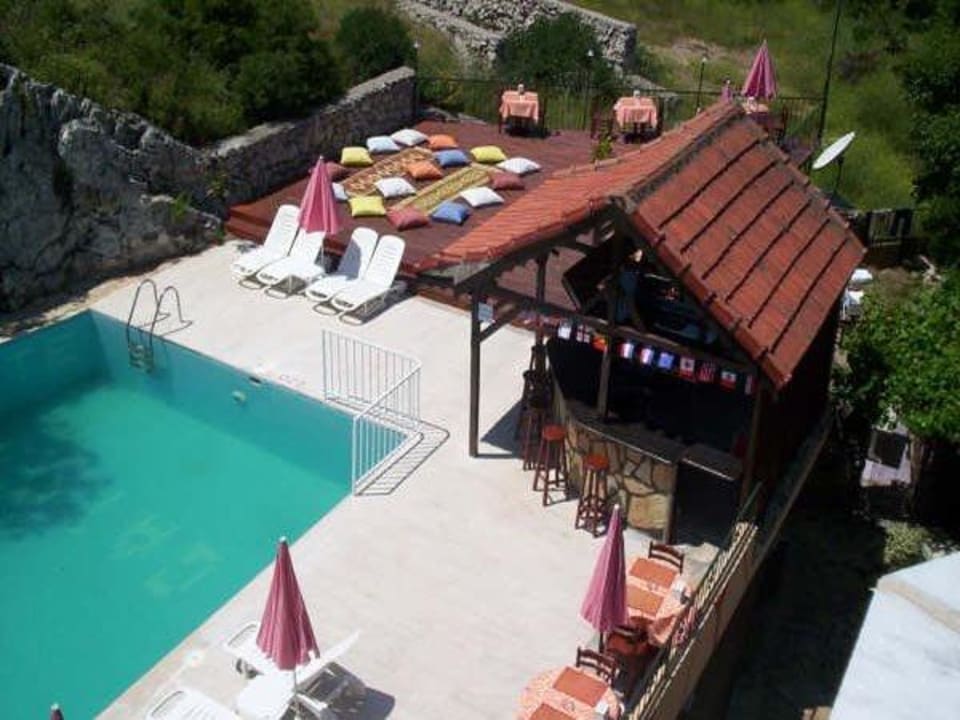 Few from balcony to pool and poolbar Our Dream Butik Hotel