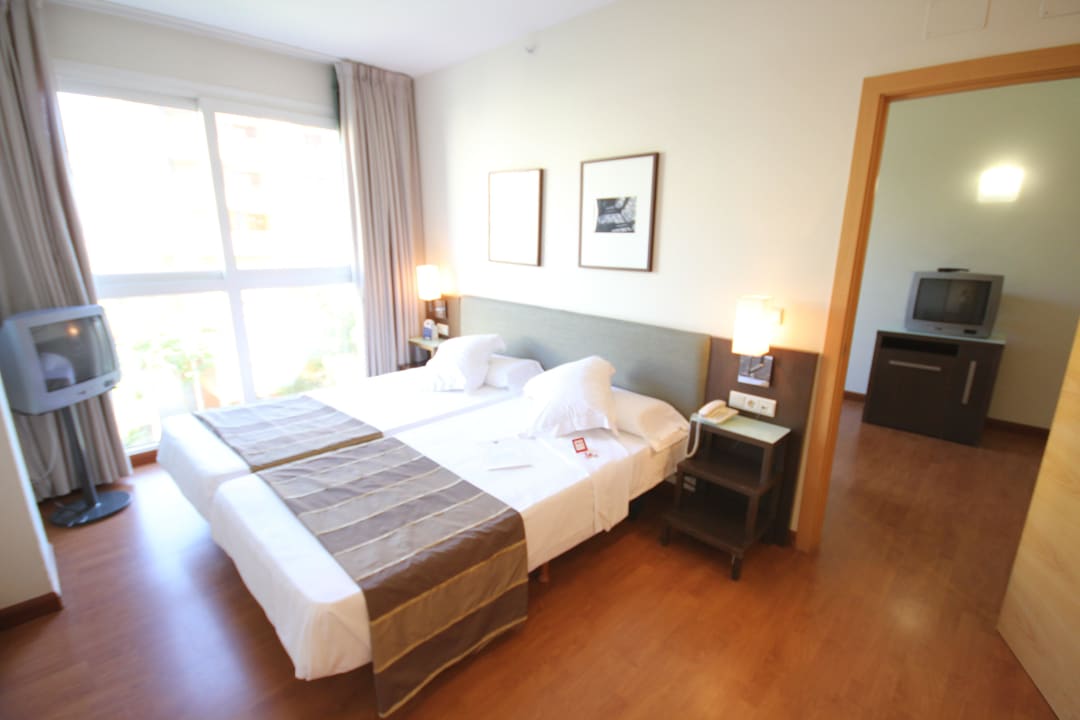 Dormitorio en Junior Suite Hotel Vértice Sevilla